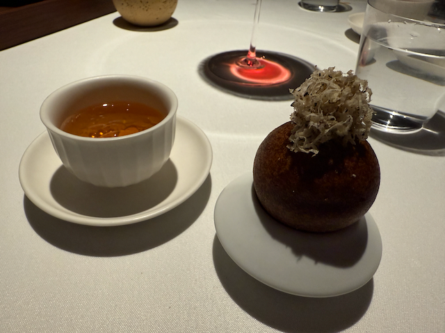 broth and savory beignet