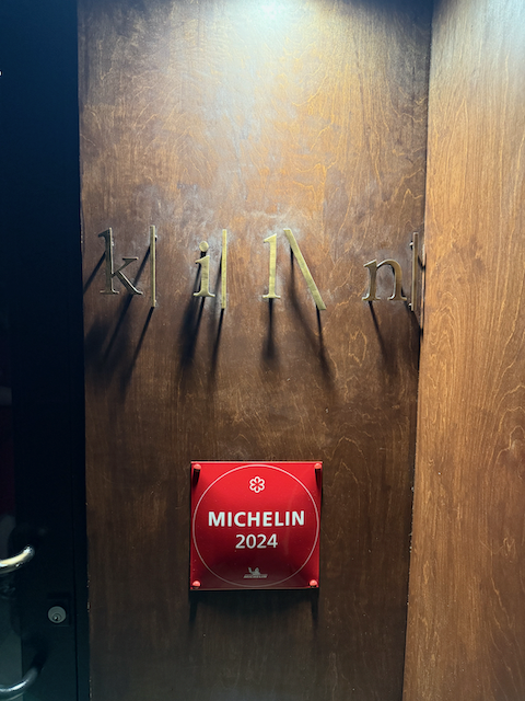 the exterior sign with a michelin star sign